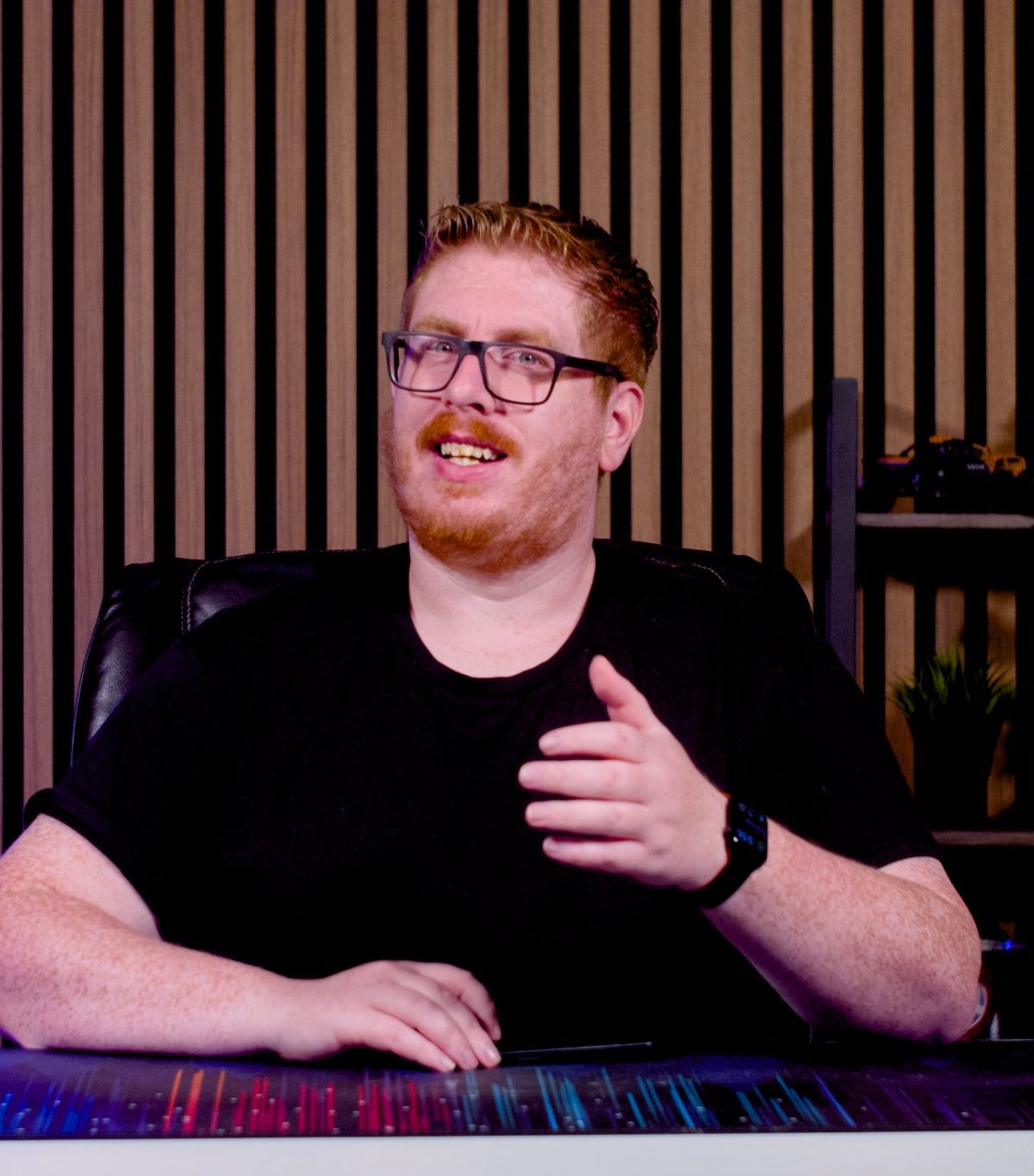 Lyndon, founder of M13, at his desk