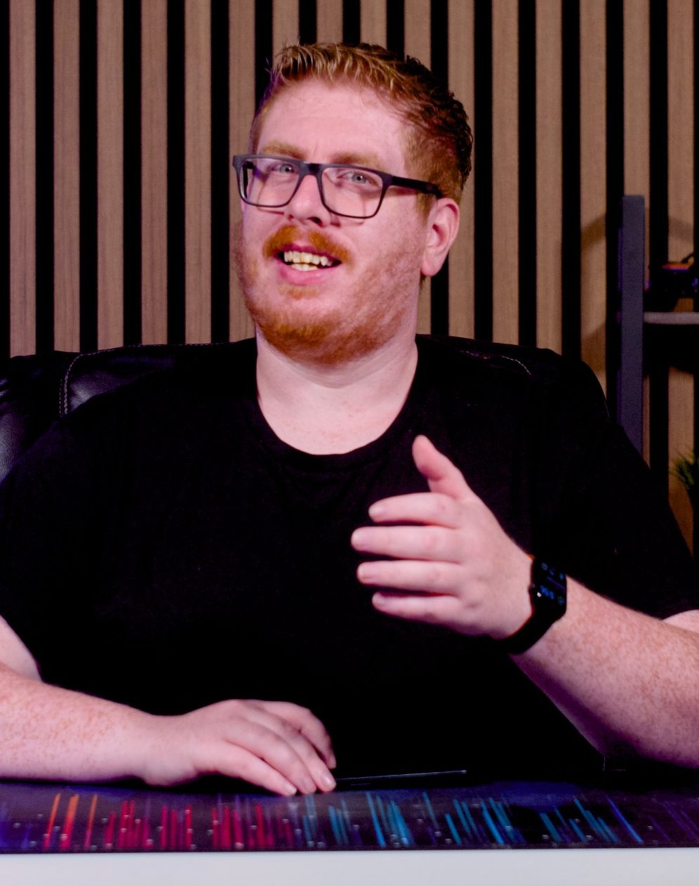 Lyndon at his desk, mid-conversation